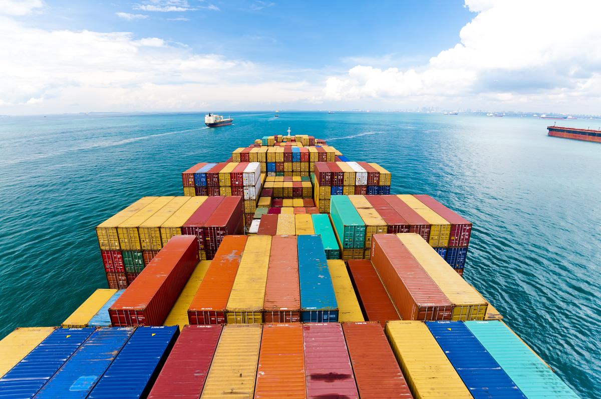Cargo ship entering shipping port